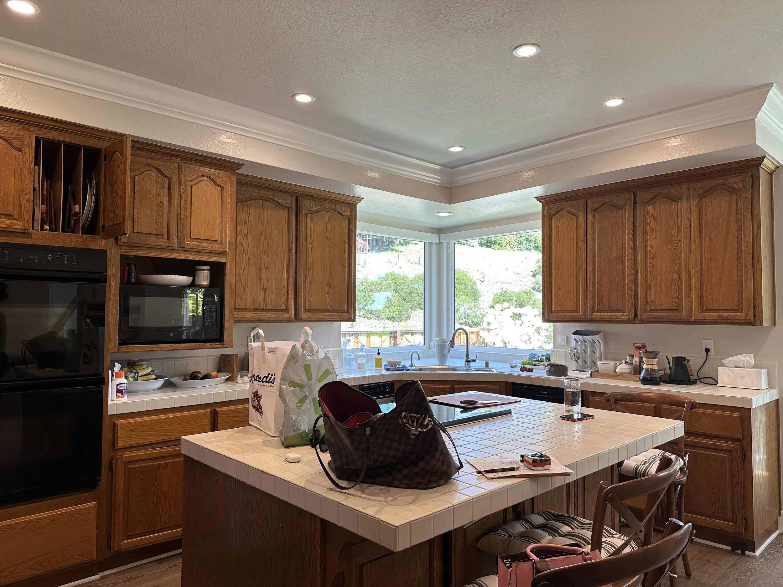 Dated Blackhawk Kitchen Extensive Remodel - Before - Removal of soffit, raised ceiling, raised floor, window addition