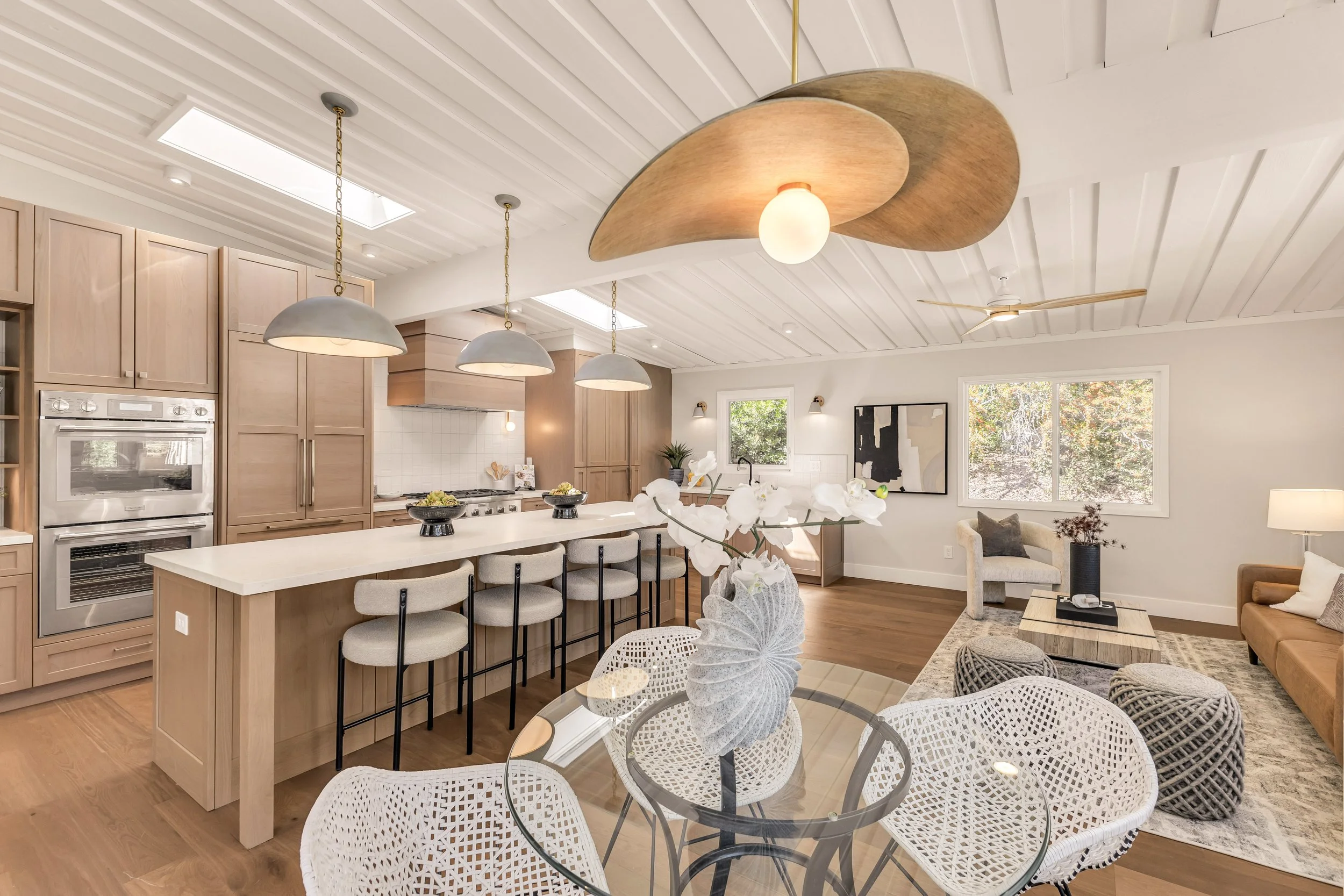 Award-winning Orinda mid-century kitchen remodel featuring clear alder cabinetry, a nine-foot island, and an open layout.