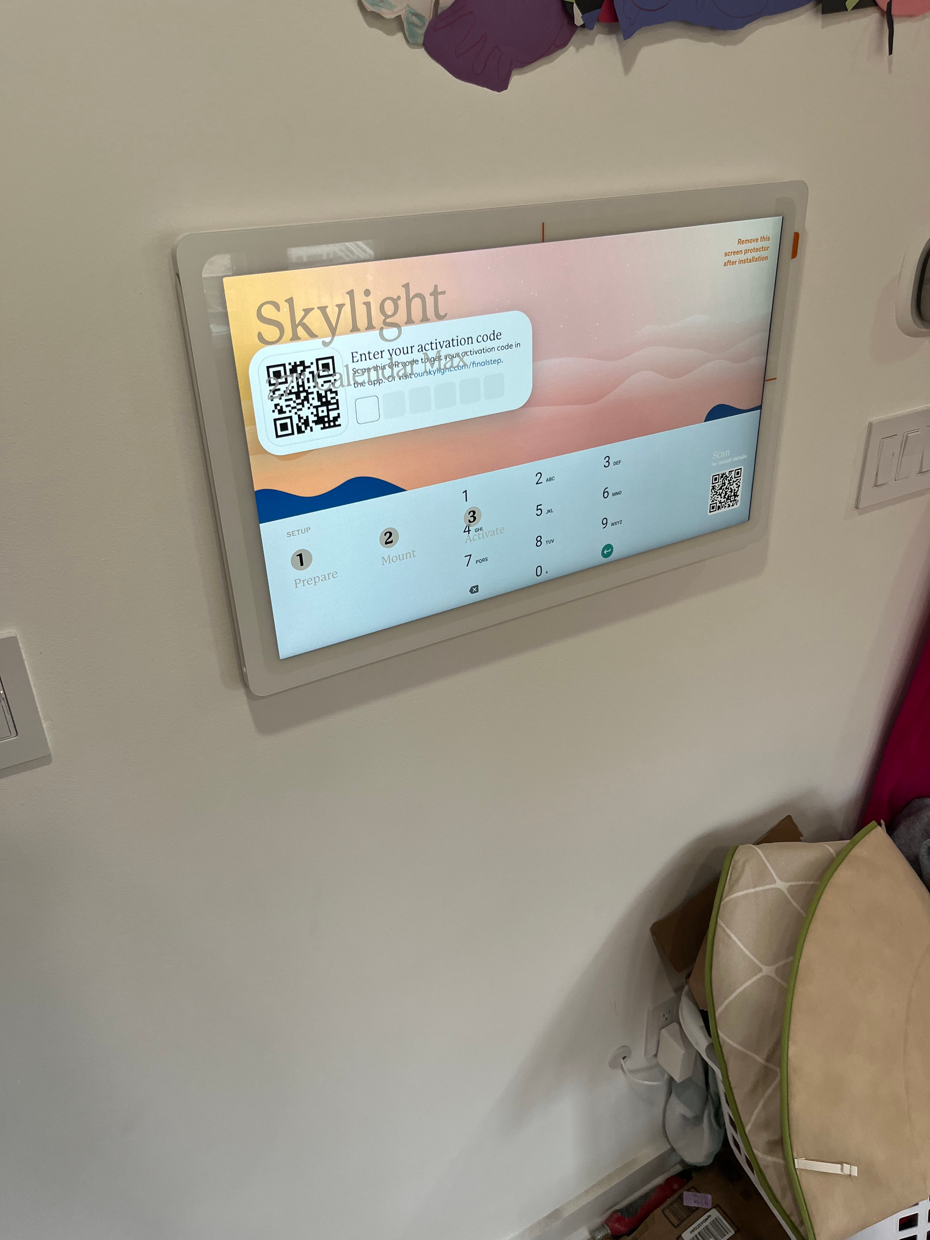 Touchscreen interface at an airport for skydiving activity check-in with a QR code and options to select personal details.