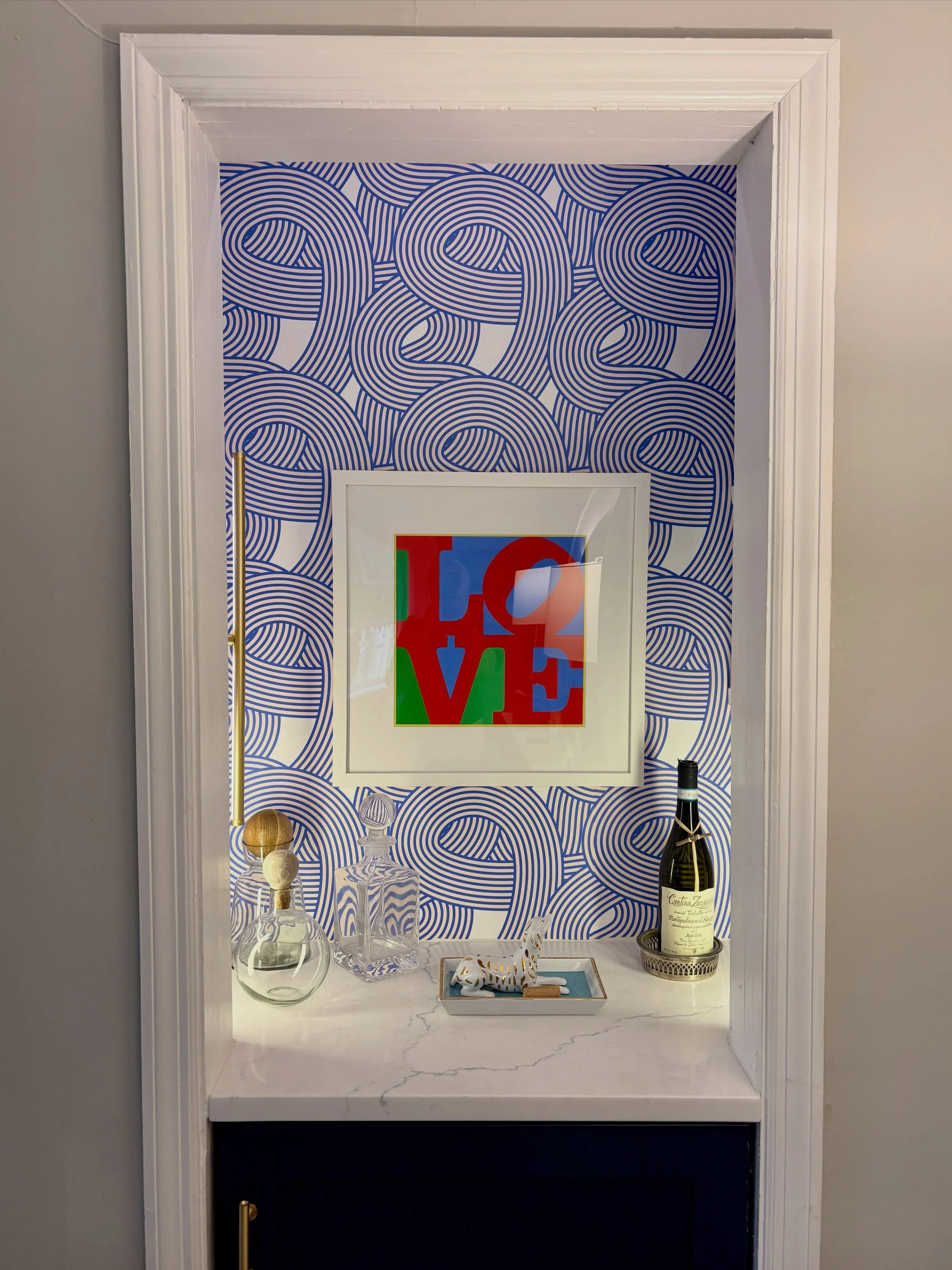 Less laundry, more cocktails:  that&rsquo;s the empty nest math.

When my clients found themselves with a little extra space, they transformed this forgotten corner of their family room into a spot designed for gathering, unwinding, and perhaps dryin