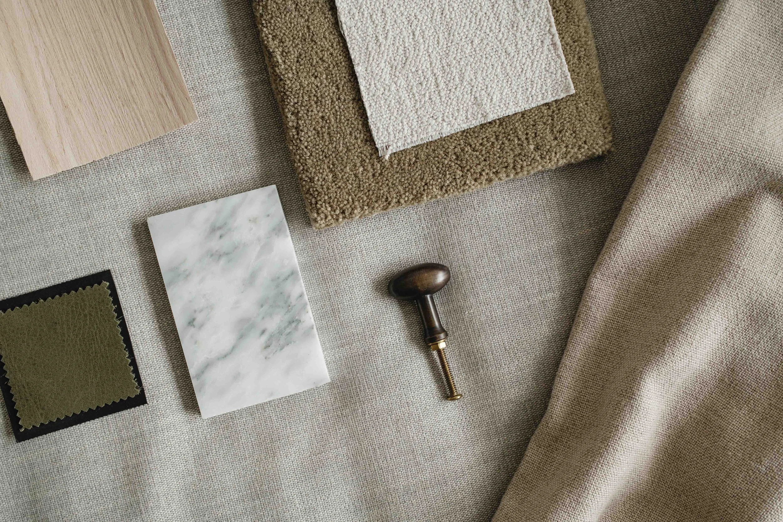 big-kaboompics_interior-design-material-board-home-styling-a-neutral-color-scheme-fabric-samples-35123 copy.jpg