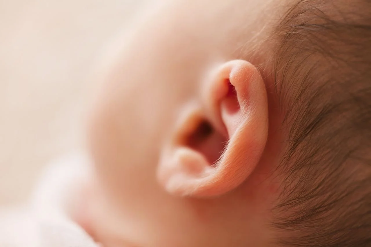Checking for a possible baby ear infection.