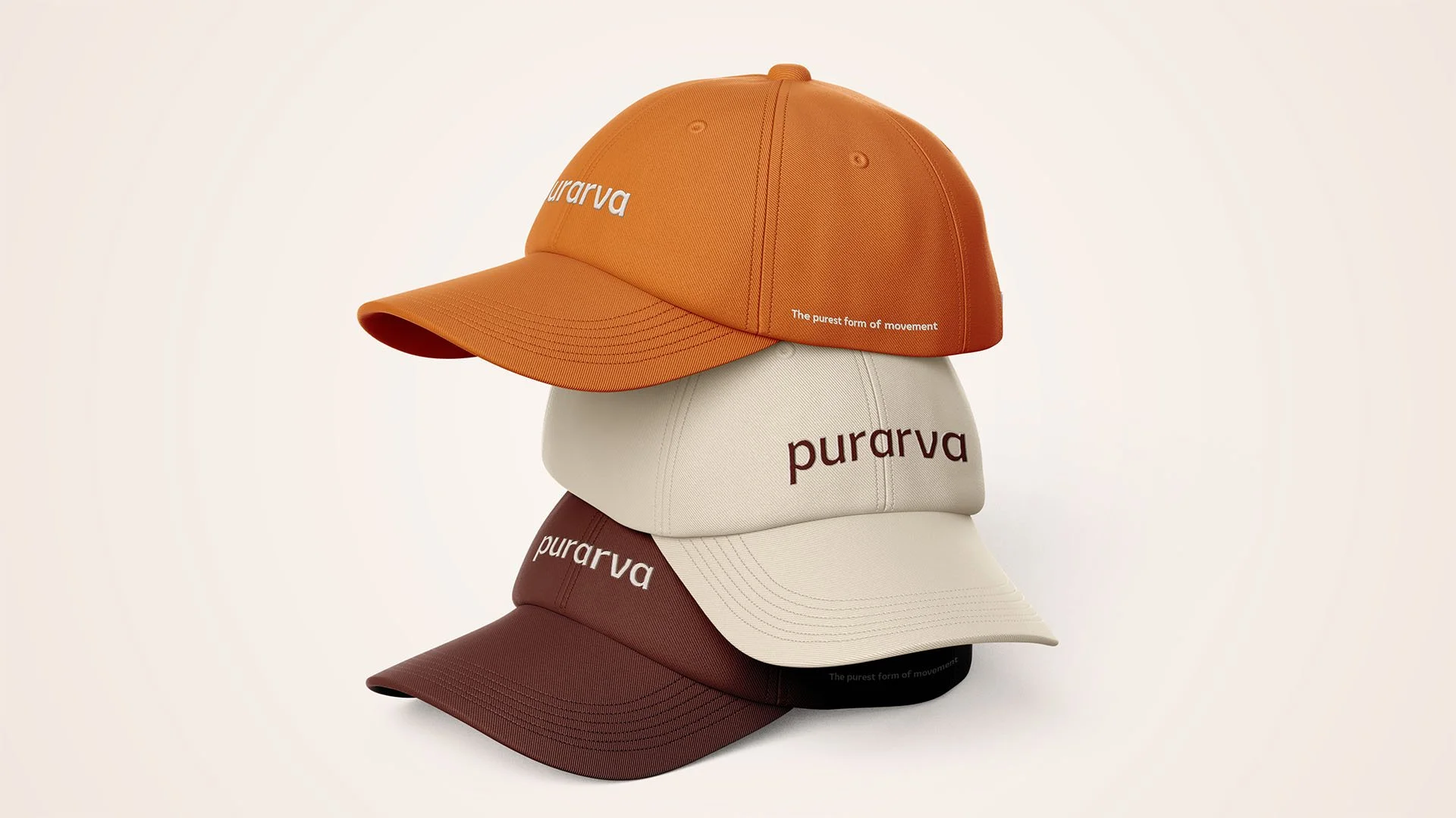 Four stacked baseball caps in orange, beige, brown, and black with the brand name 'purarva' embroidered on the front.