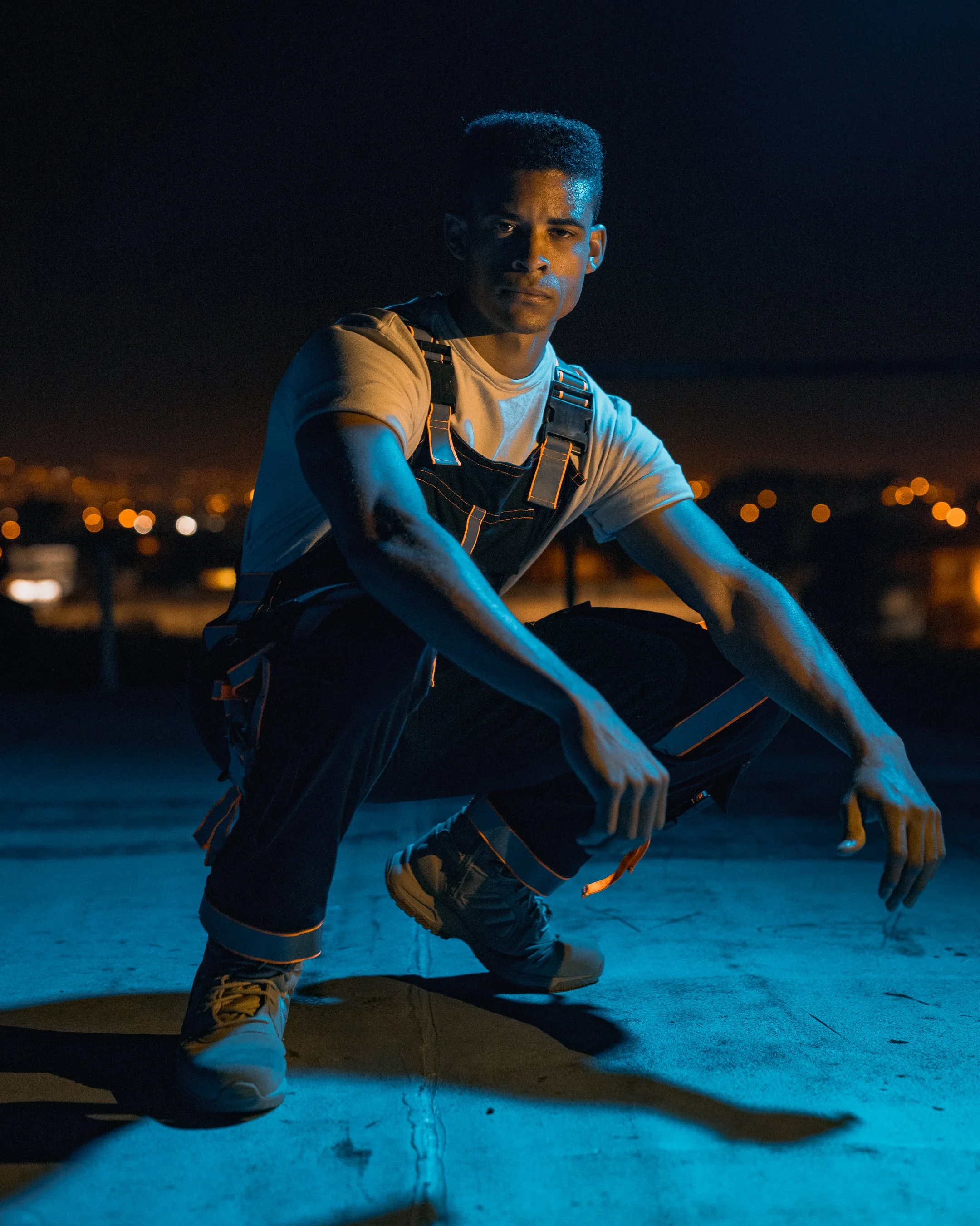 Cinematic portrait of a black male model wearing an overall in Cape Town, South Africa by photographer Vanartist