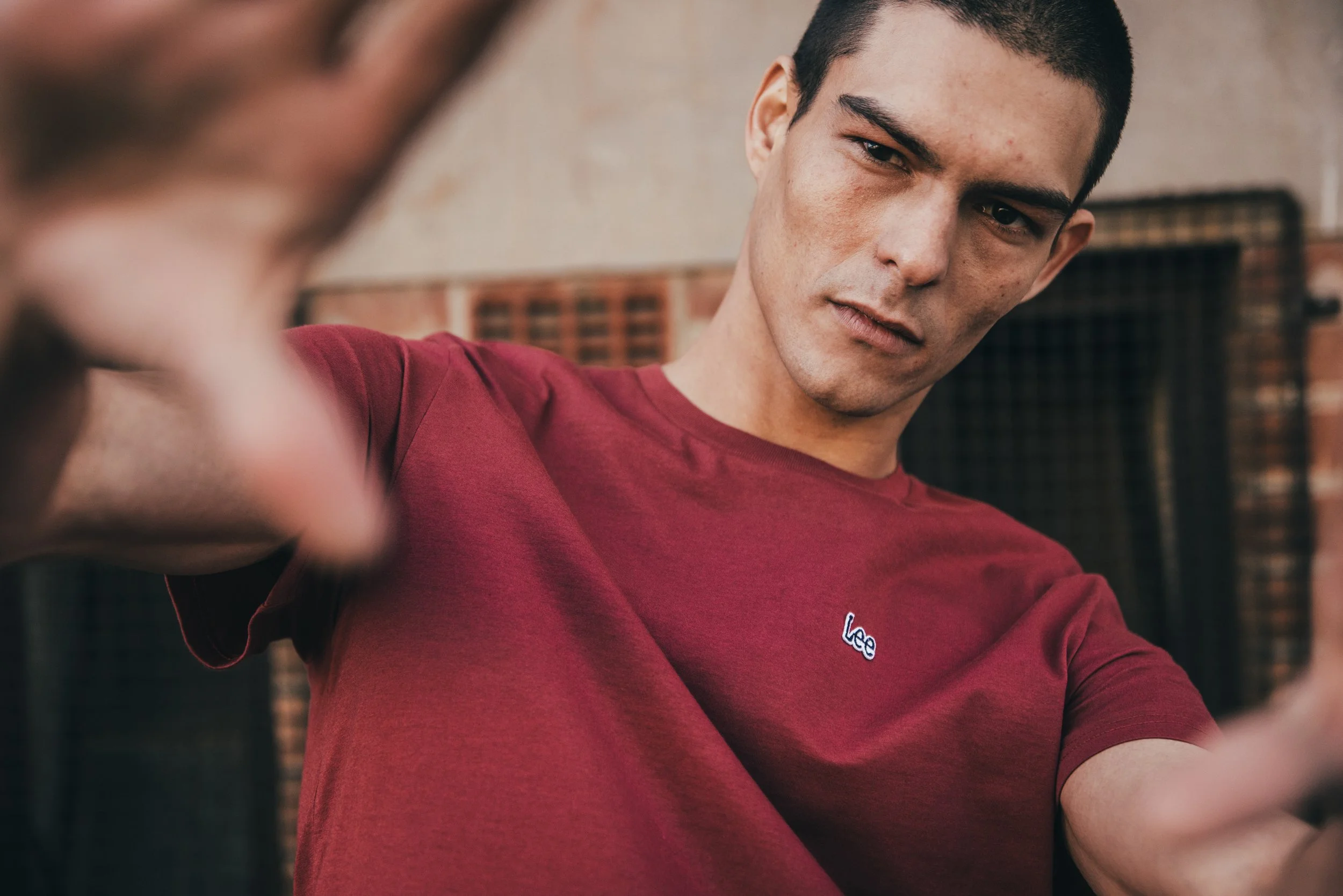Fashion photography for Lee Jeans of a young model wearing a red t-shirt in Cape Town, South Africa by photographer Vanartist