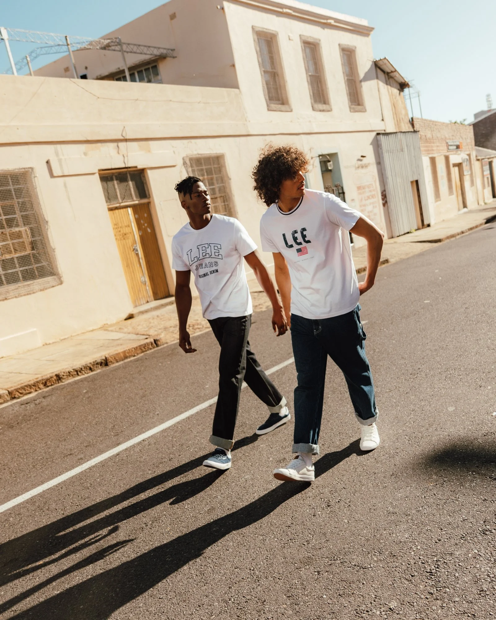 Fashion photography for Lee Jeans of two young models wearing a white t-shirts in Cape Town, South Africa by photographer Vanartist