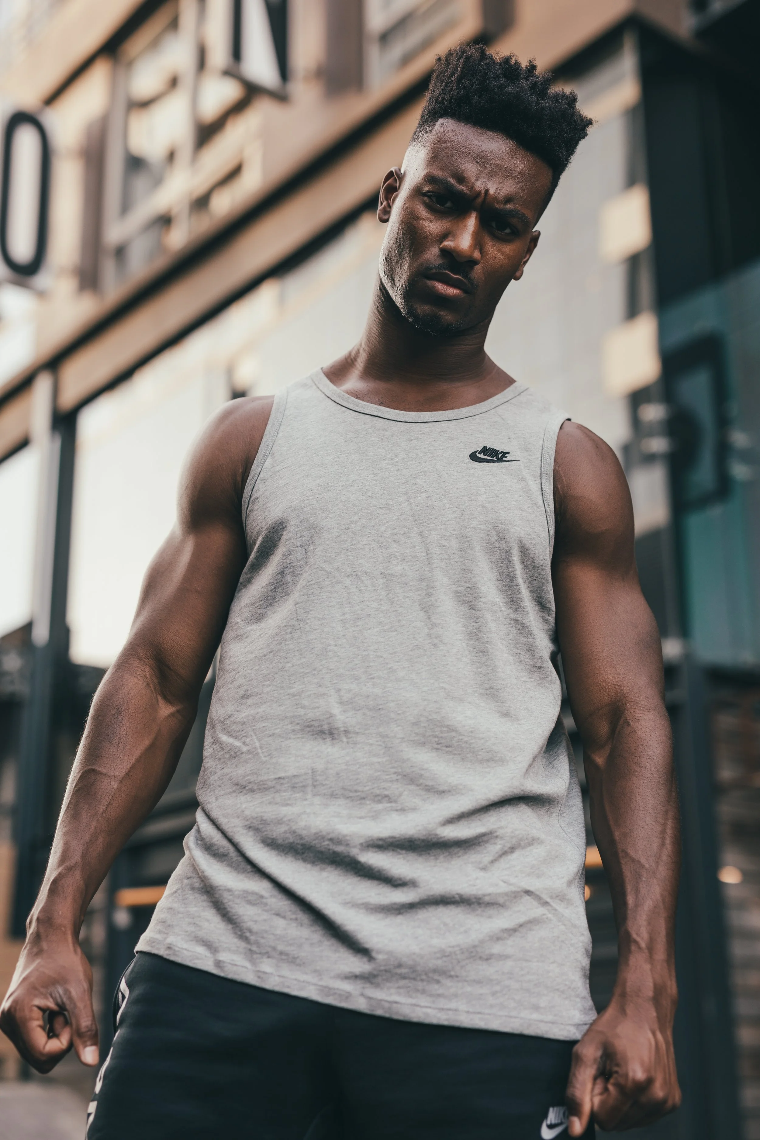 Lifestyle photography of black male model wearing Nike in Cape Town, South Africa by photographer Vanartist