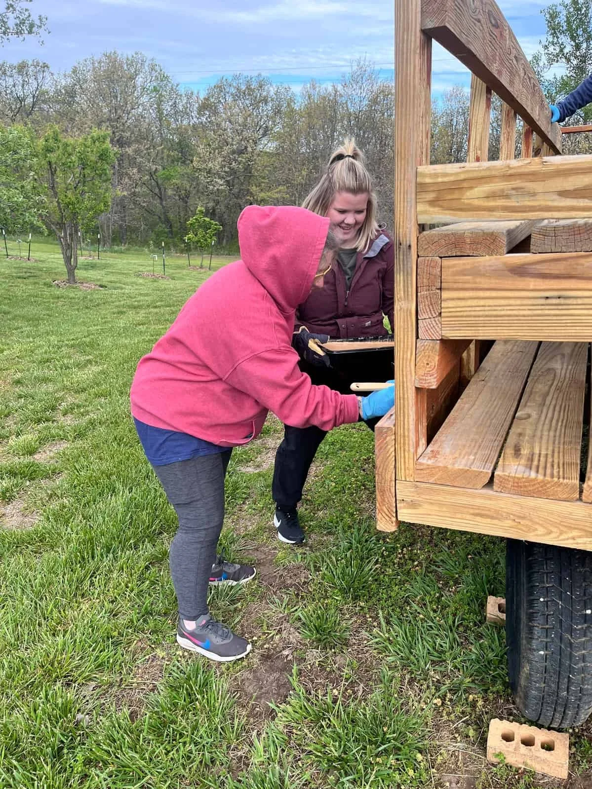 Volunteers working in the Joy Meadows garden and outdoor spaces