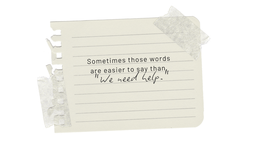 A handwritten message on notebook paper explains that saying “We’re doing well” can be easier than admitting, “We need help.”