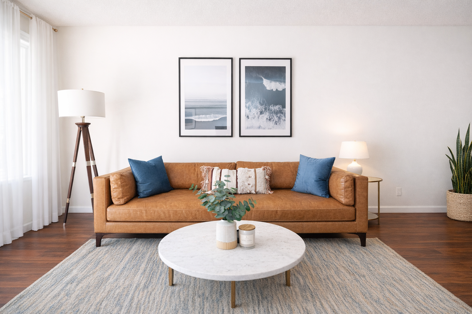 Modern living room with ocean art.png