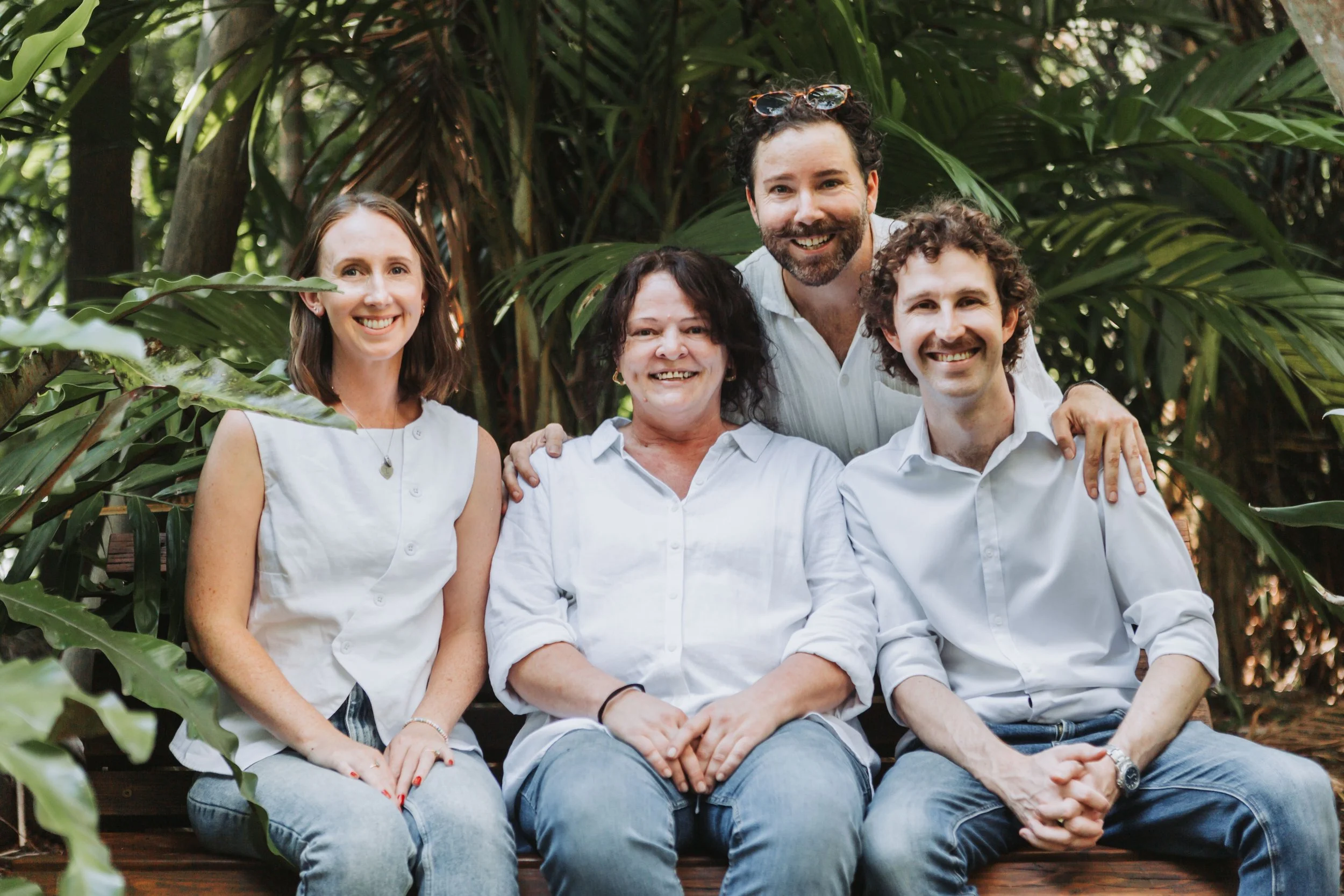 Abbotts and Co Lawyers team smiling at the Coffs Harbour Botanic Garden