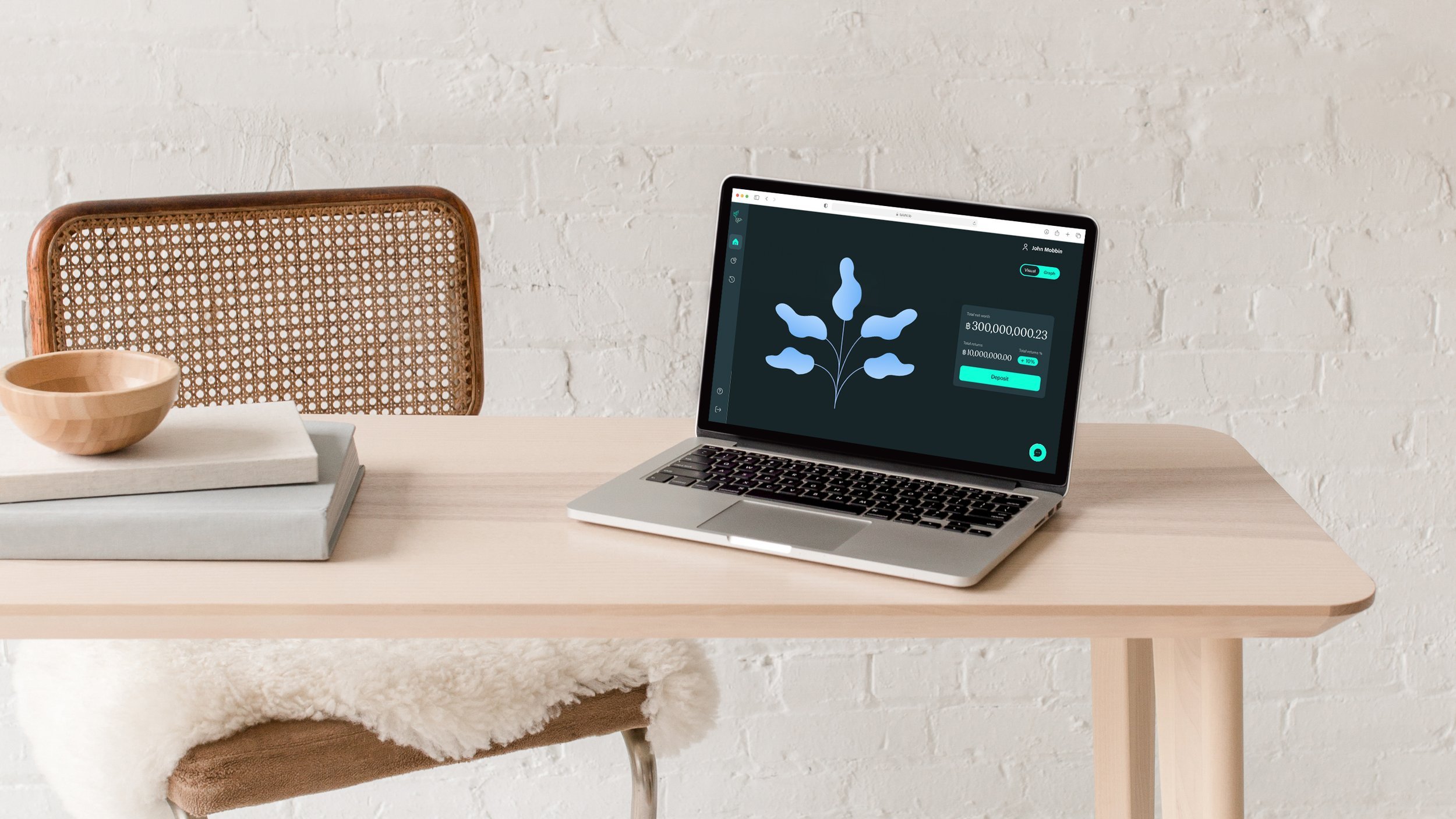 Taishi.io mock up product on macbook screen laying on a wooden table aesthetic mood