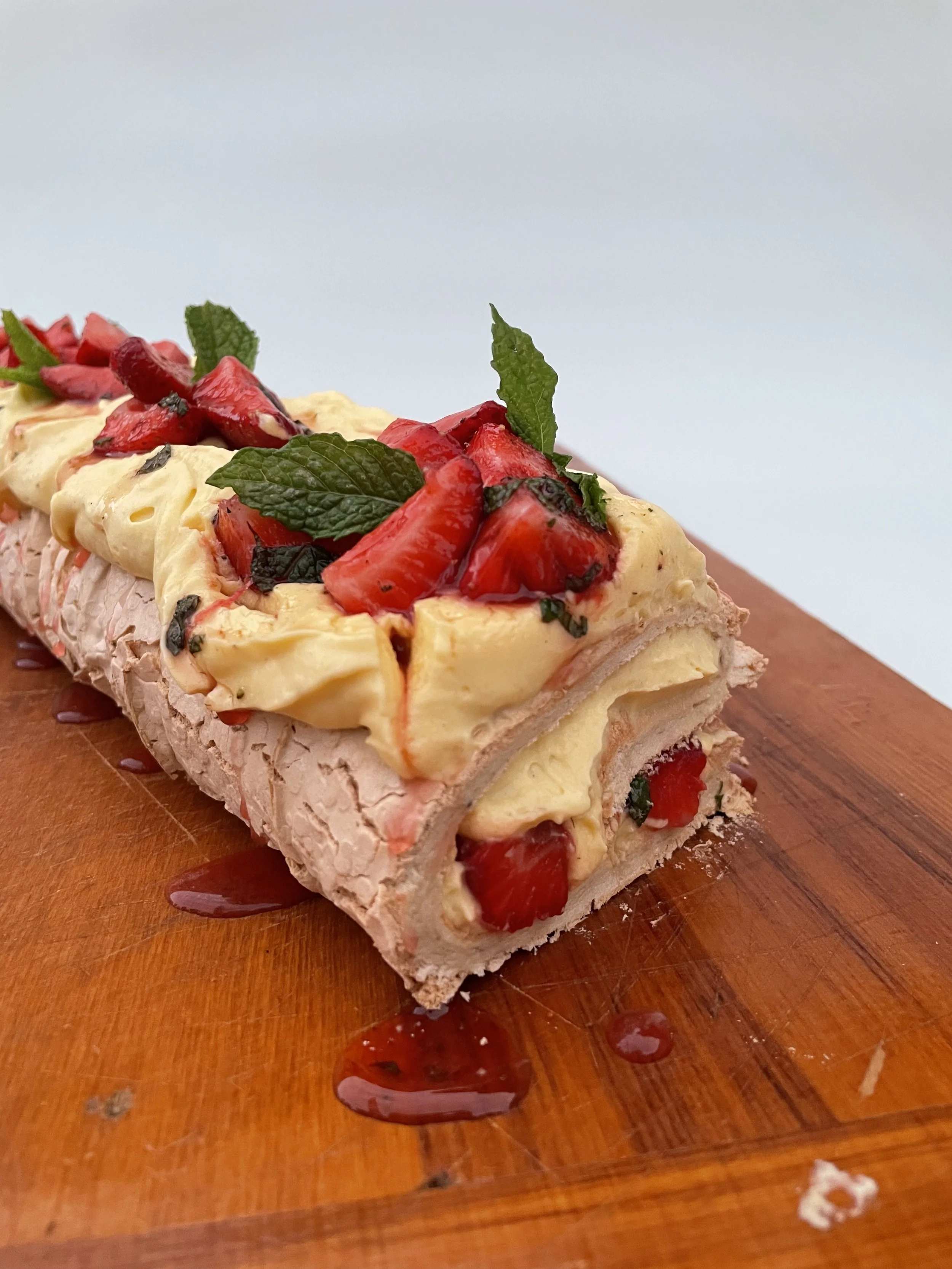 Strawberry, mint + kaffir lime meringue roulade