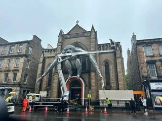Installation of Skywalker Gibbon by Australian artist Lisa Roet, at House of Oz, King's Hall, Edinburgh in 2023. A triumph of Blu Fire collaboration, persistence and ingenuity, in the face of multiple planning challenges!