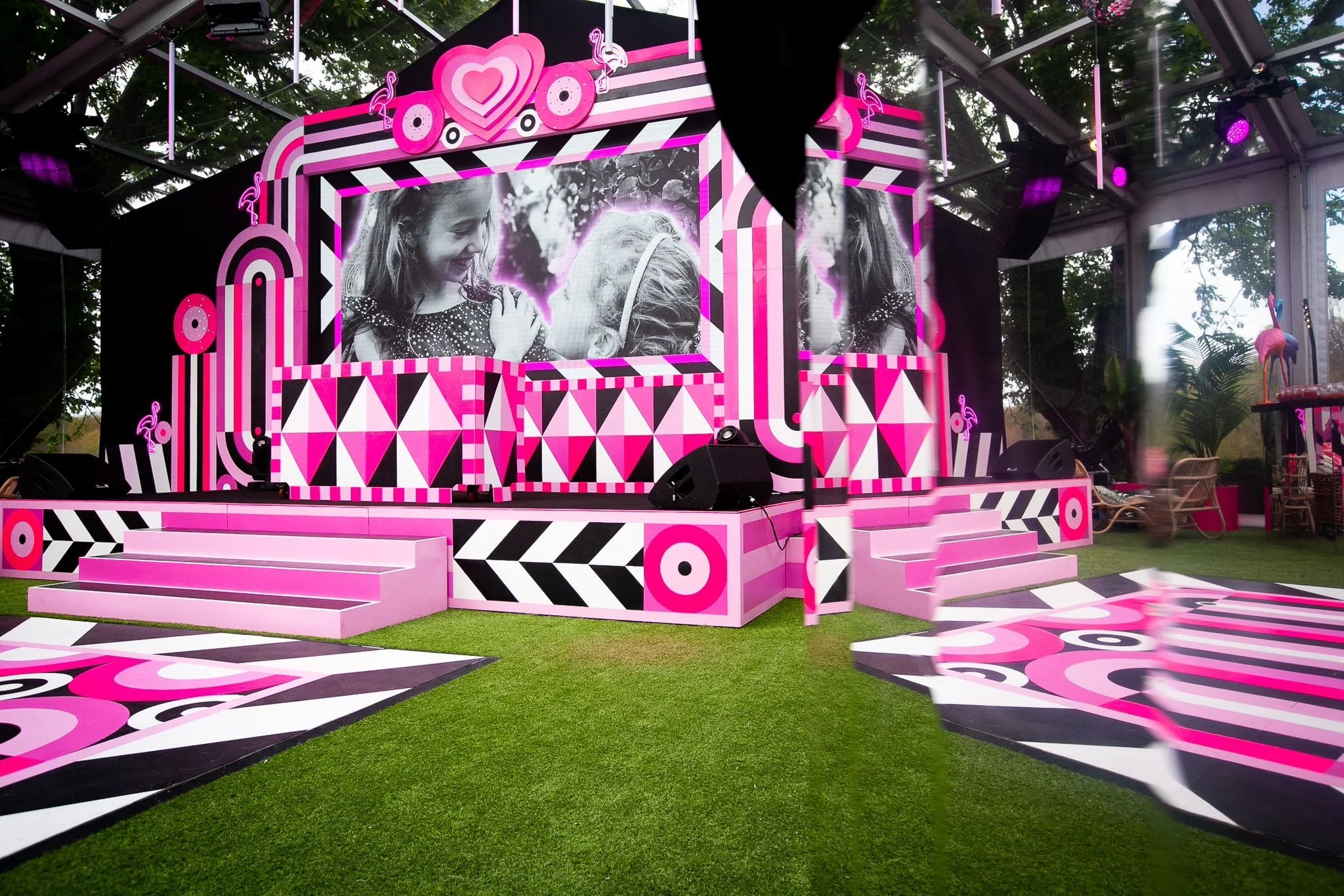 The Flamingo Room stage set at a Neon Safari party produced by Blu Fire.