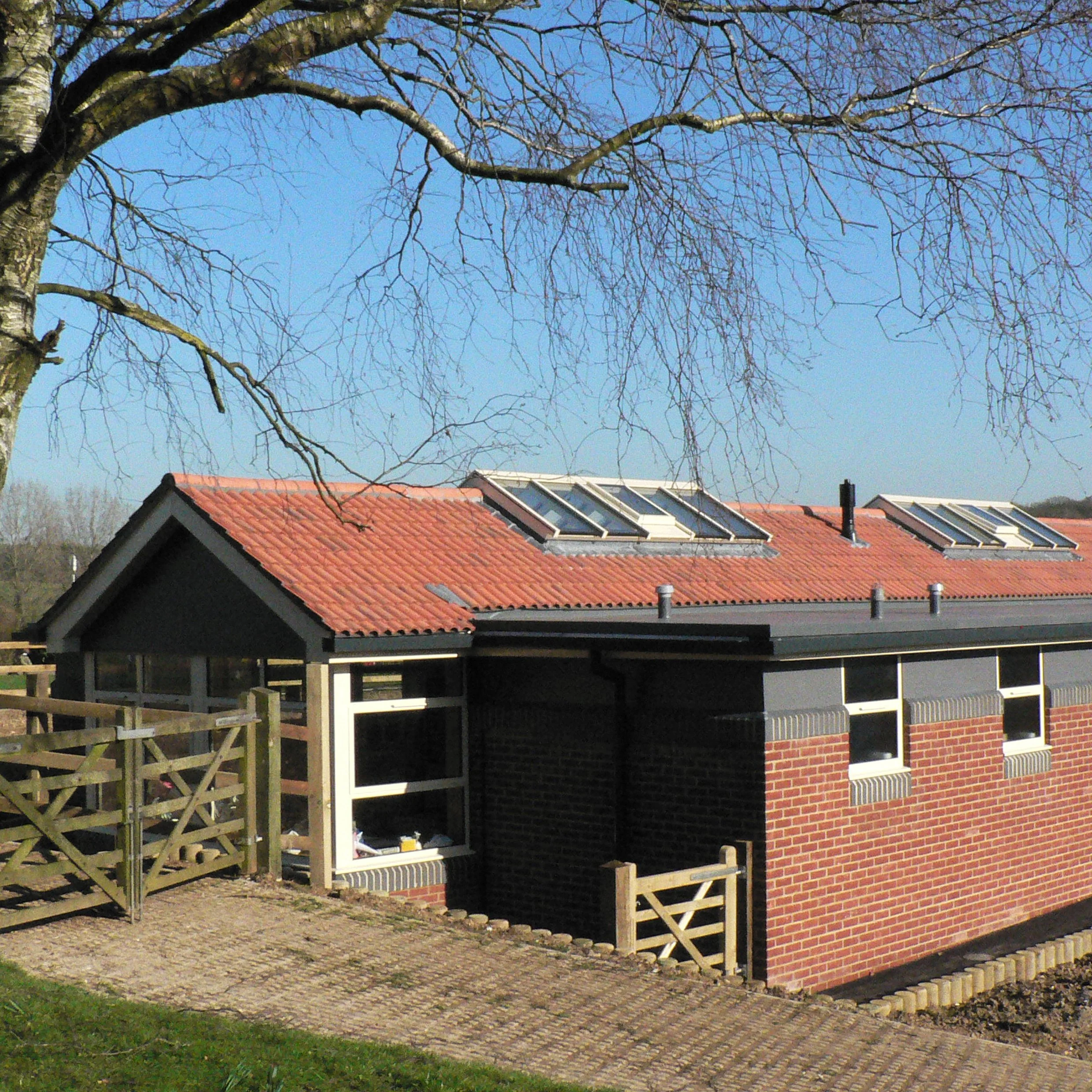 Primary school extension with matching materiality to complement the existing structures.