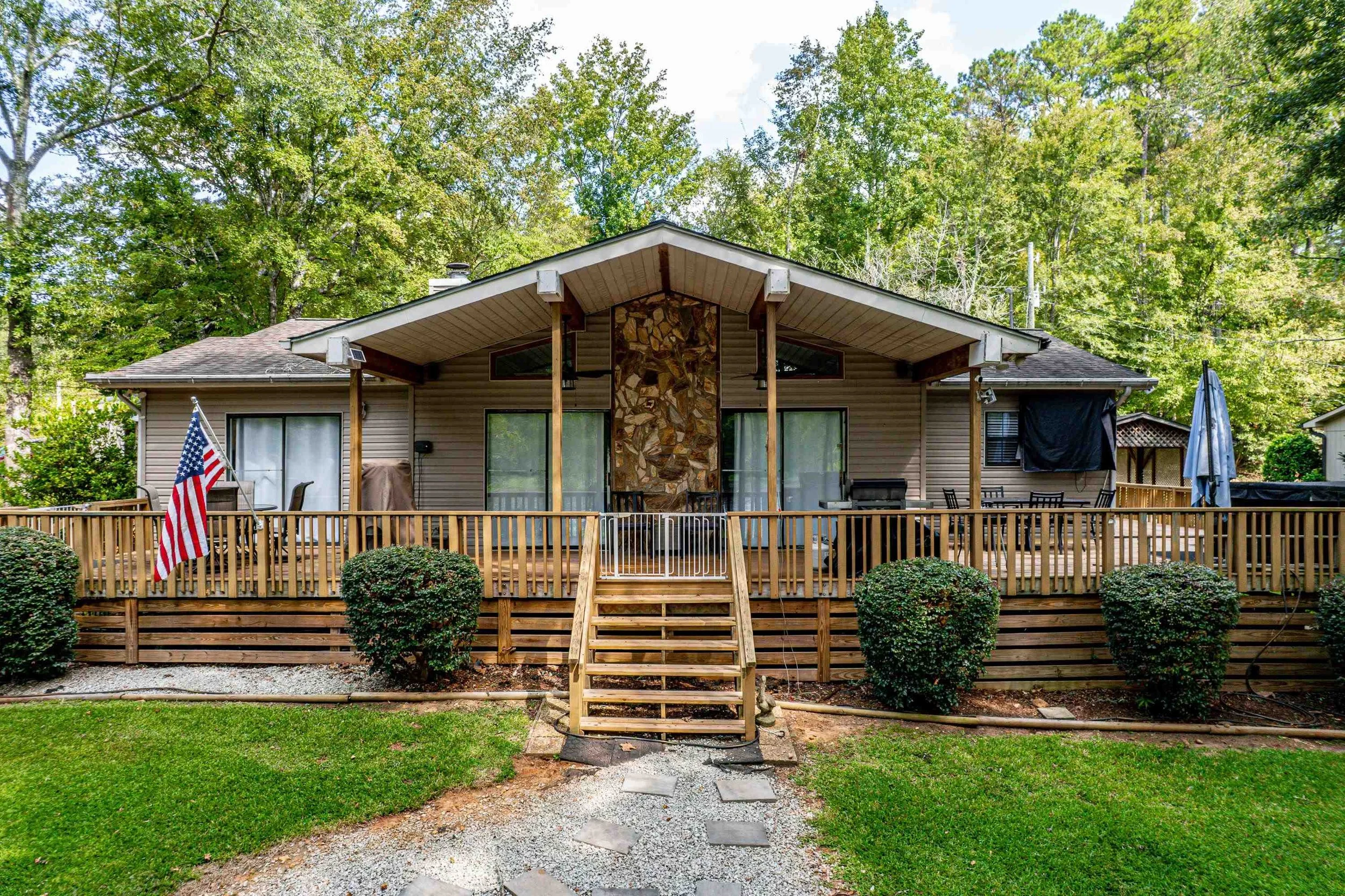 Discover Your Dream Lake Escape at 237 North Steel Bridge Road, Eatonton, GA!