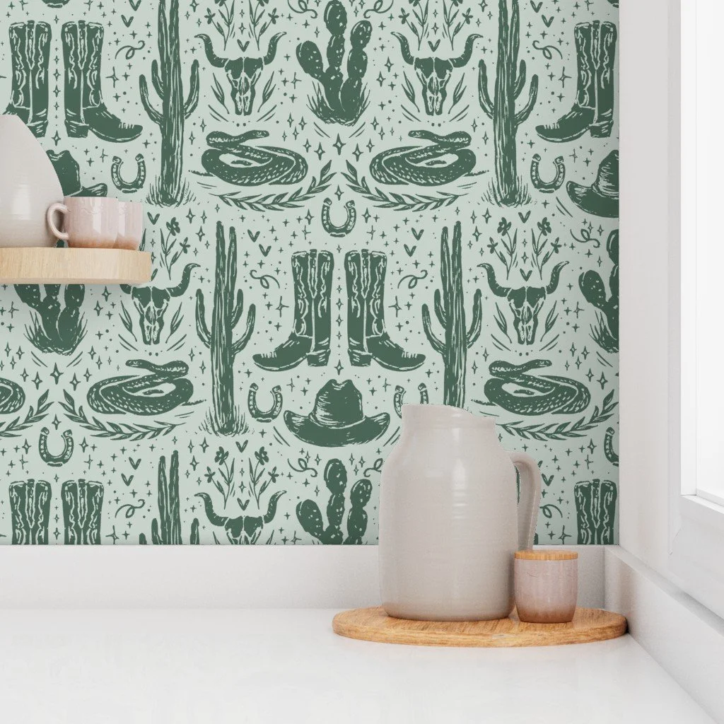 Texas wallpaper with hand-drawn boots, desert cactus plants, snakes, & cow skulls