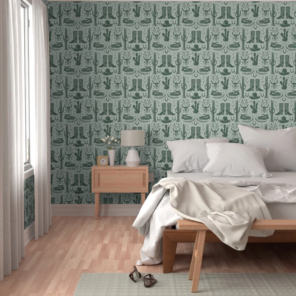 Texas desert-themed wallpaper with hand-drawn boots, cactus plants, snakes, & cow skulls