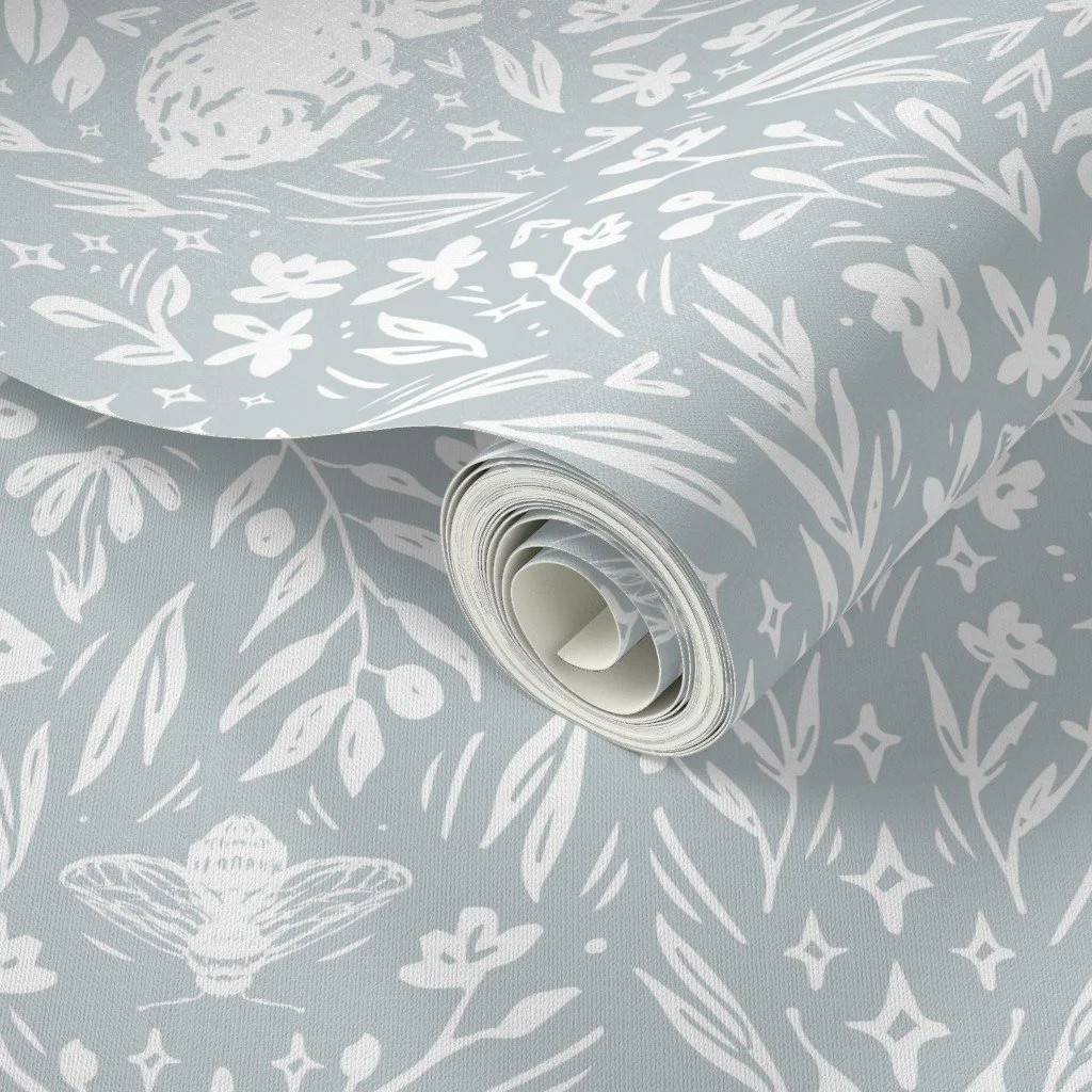 Woodland Animal Wallpaper for Baby and Kids  This scandinavian woodland themed wallpaper features hand-drawn animals & florals, including a fox, rabbit, & a bee, among other details.