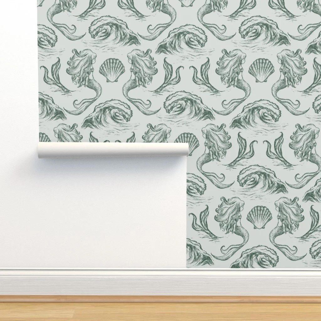 mermaid wallpaper design in green for elegant bohemian bathrooms, living rooms, rental properties, and Airbnbs. This fantasy style mermaid art features ocean waves and seashells.