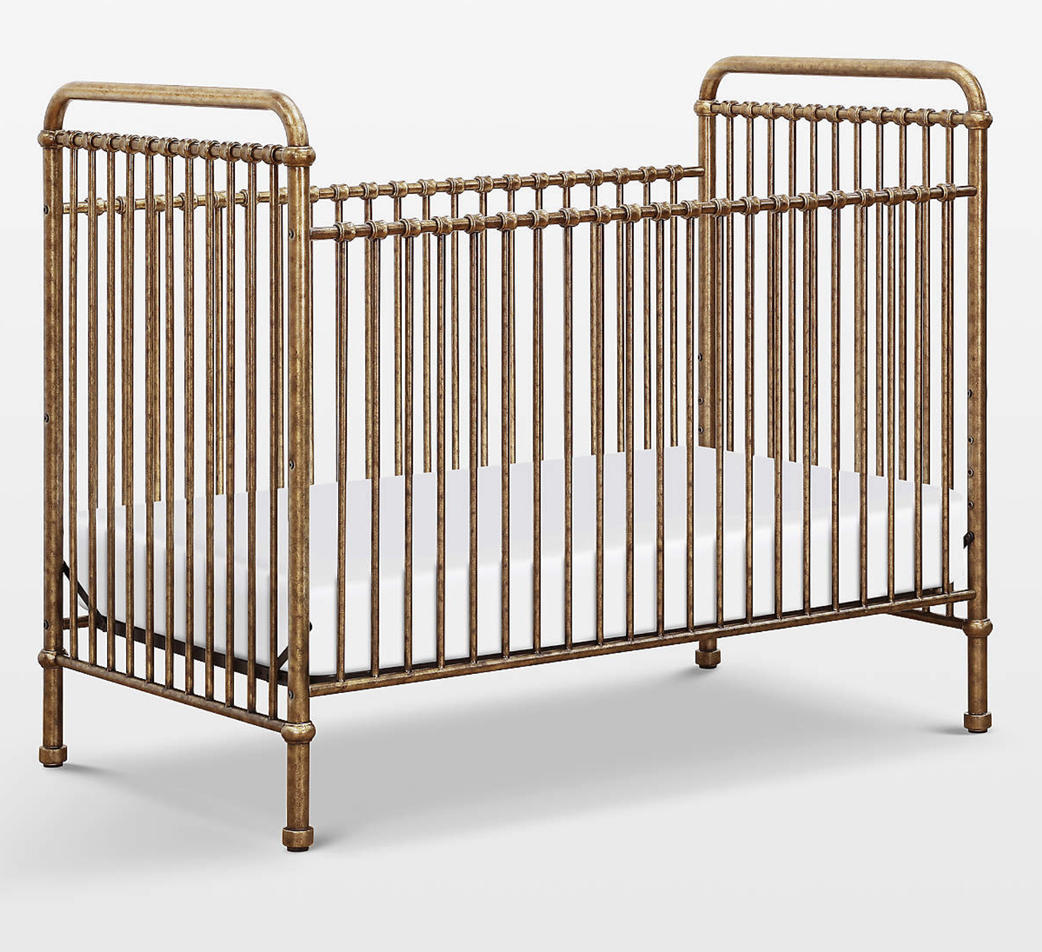 gold iron crib for upscale nursery design