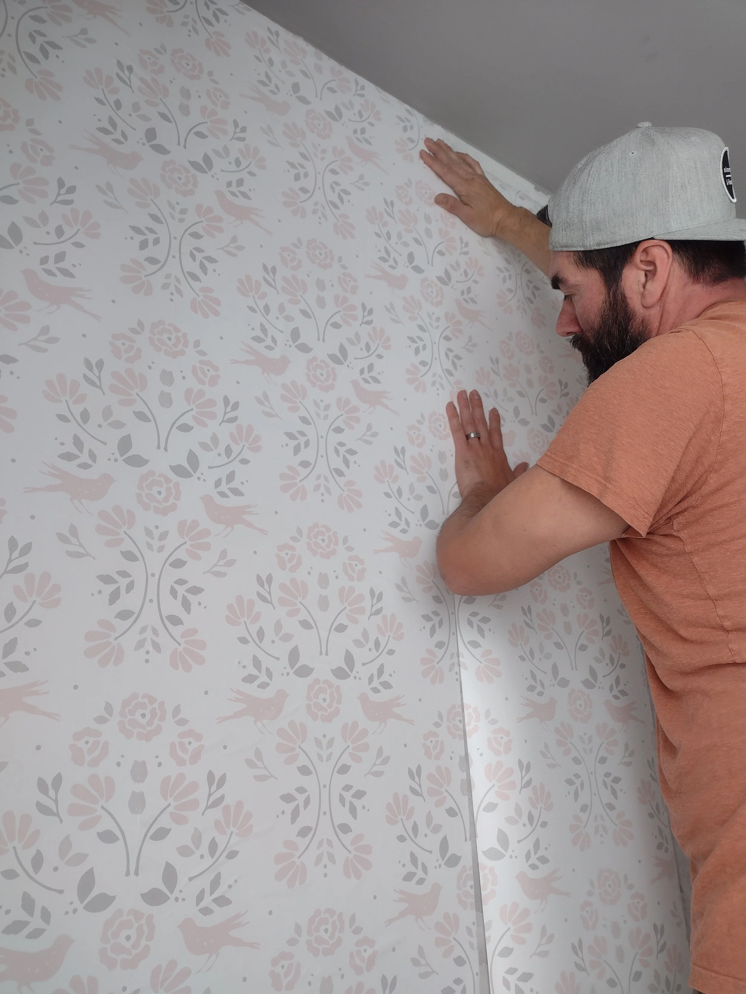 installing peel and stick wallpaper in a nursery or girls bedroom
