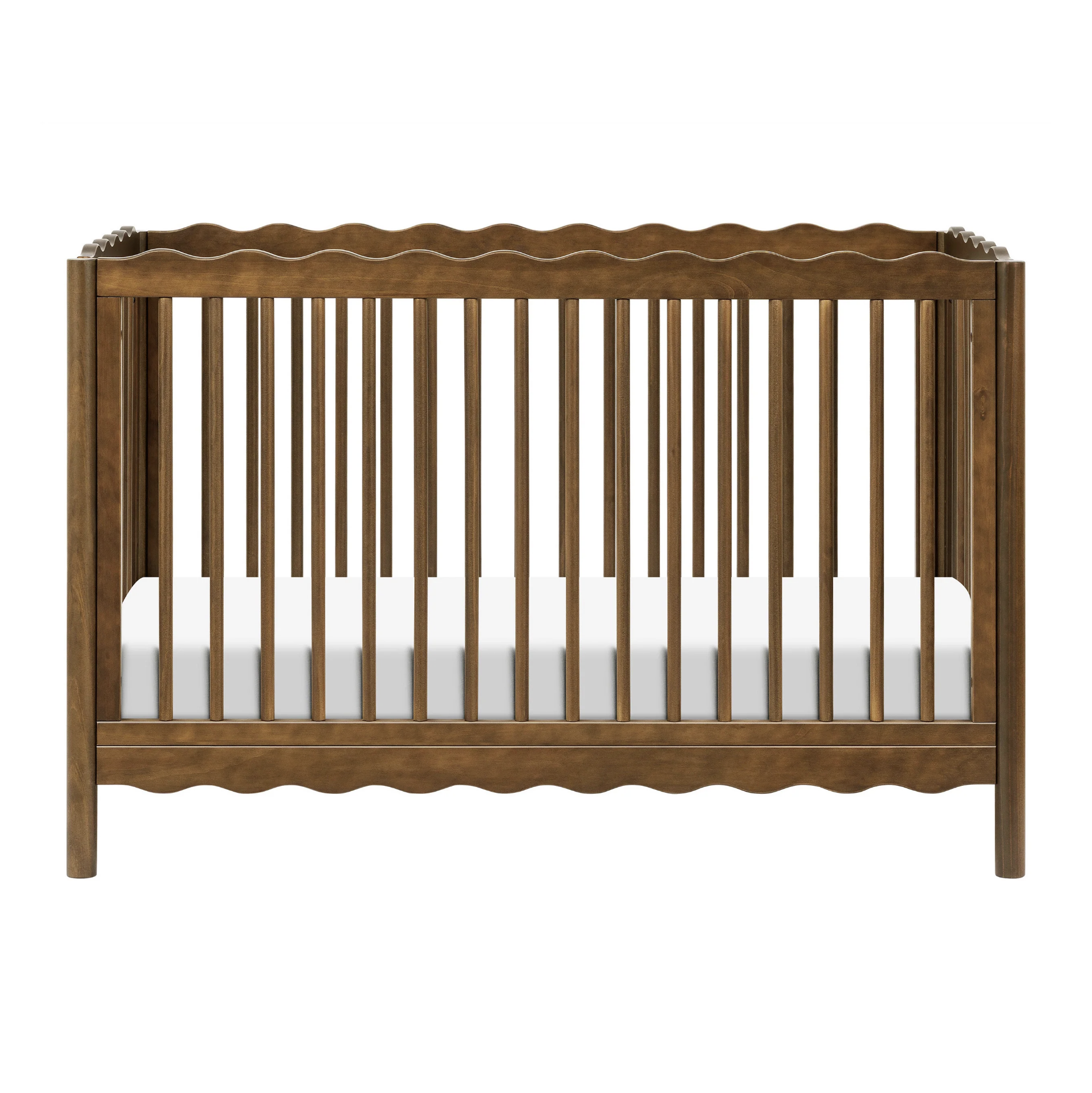 Scalloped wooden crib for 2026 nursery decor