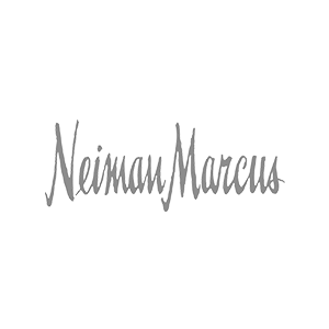 The image features the brand collaborator 'Neiman Marcus' logo written in a stylish script font.
