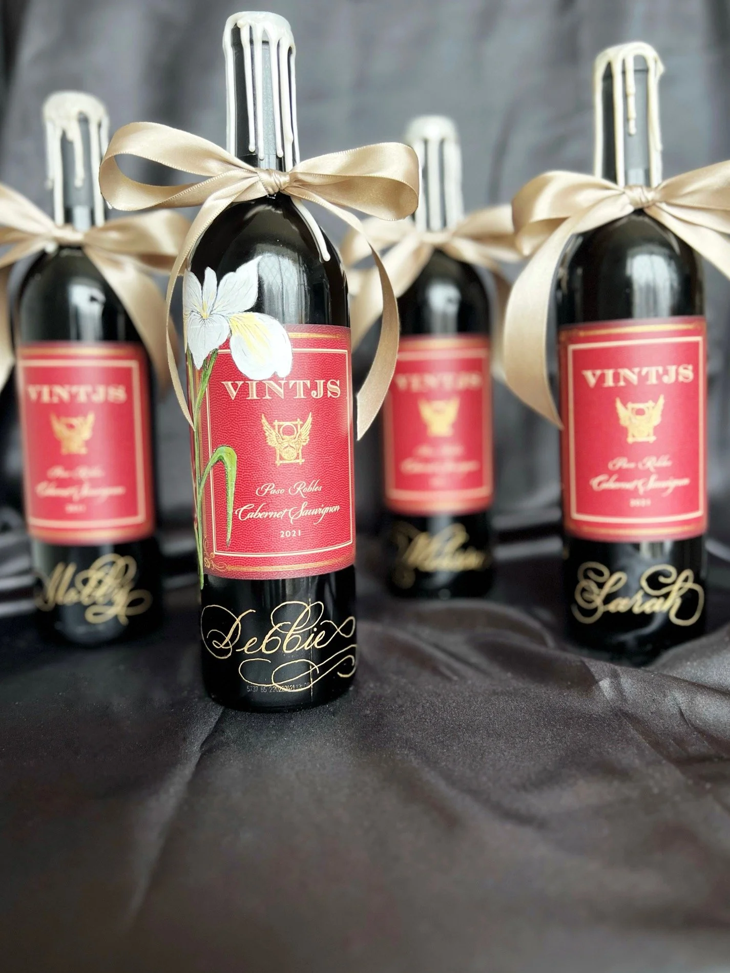 Calligraphy name engraved cabernet sauvignon bottles