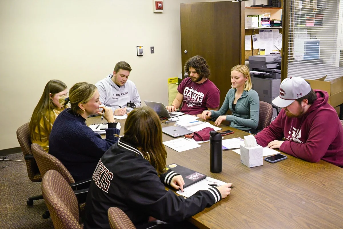 The Dawg Pound Executive Board gathers in the Office of Student Engagement for their weekly meeting Feb. 20, 2025 inside of the SIU Student Center in Carbondale, Illinois.