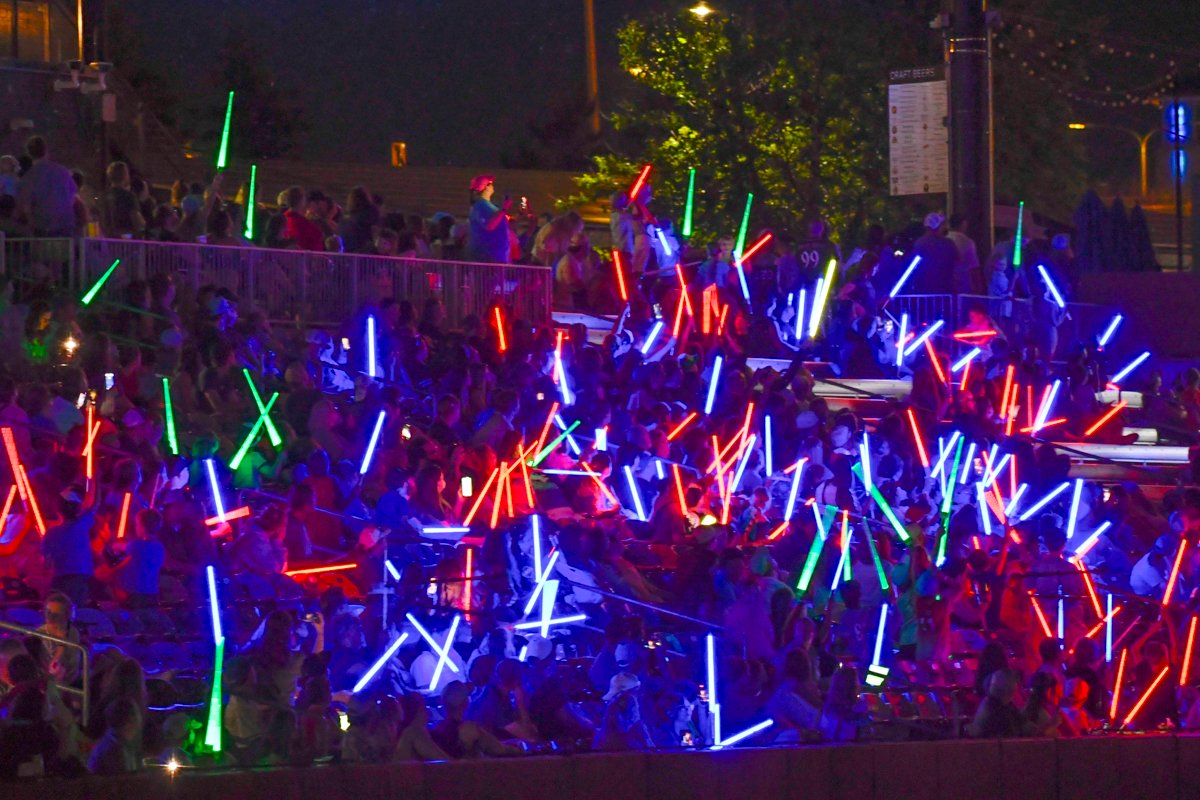 A full-house audience raises their lightsabers during the fireworks show following the St. Paul Saints Star Wars Game on June 8, 2026 at CHS Field in St. Paul, Minnesota. (Jason Isele/Isele Photography)