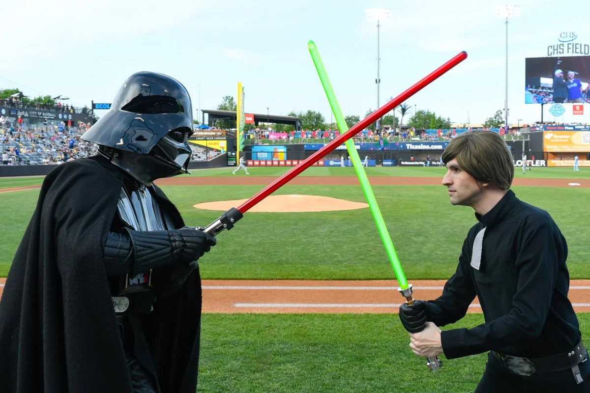 Luke Skywalker and Darth Vader cosplayers stand for a dueling photo before the St. Paul Saints Star Wars Game on June 8, 2026 at CHS Field in St. Paul, Minnesota. (Jason Isele/Isele Photography)