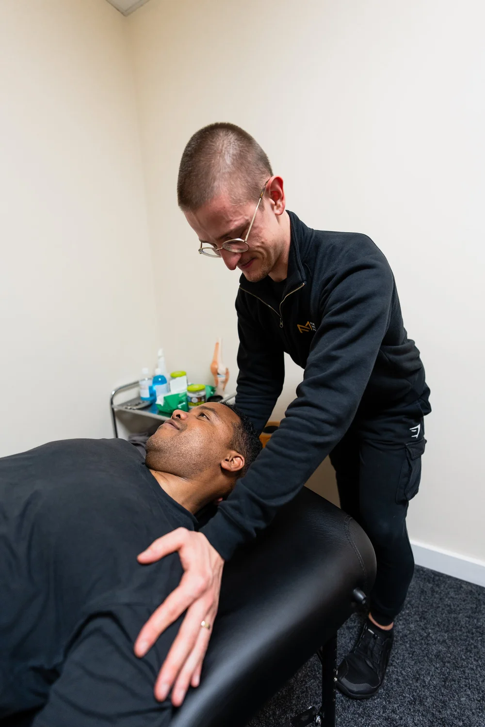 Hands-on shoulder pain treatment by a physiotherapist in Liverpool