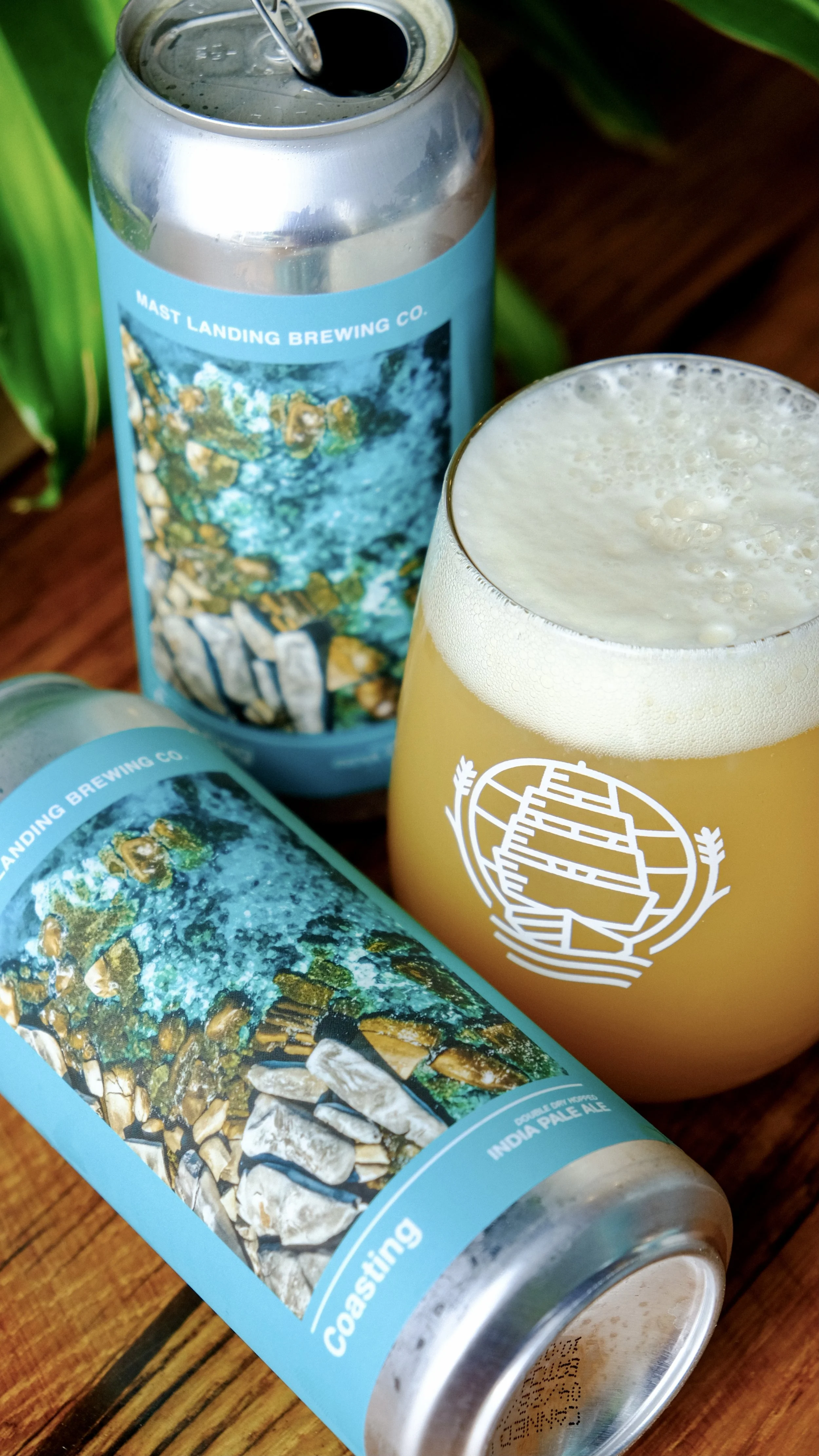 A can and glass of. Coastin IPA