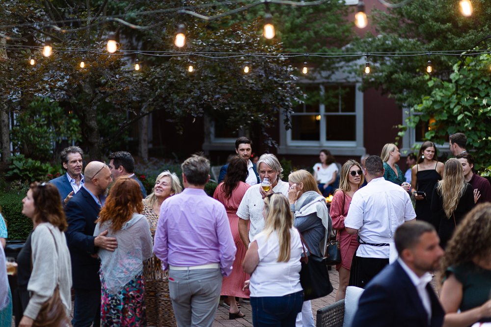  people hanging out on the patio at portland harbor hotel 