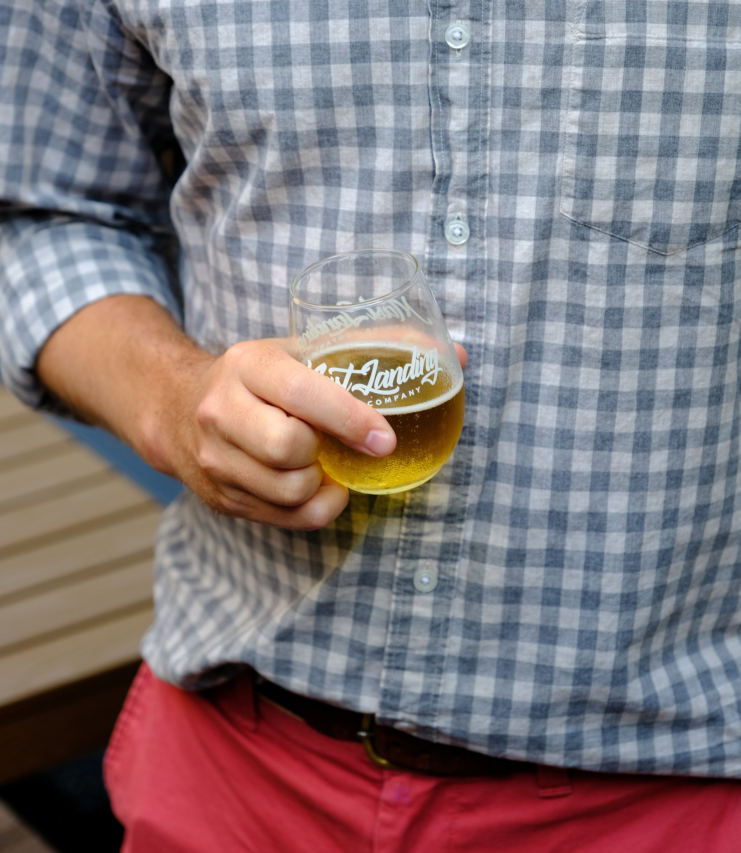  person holding a beer 