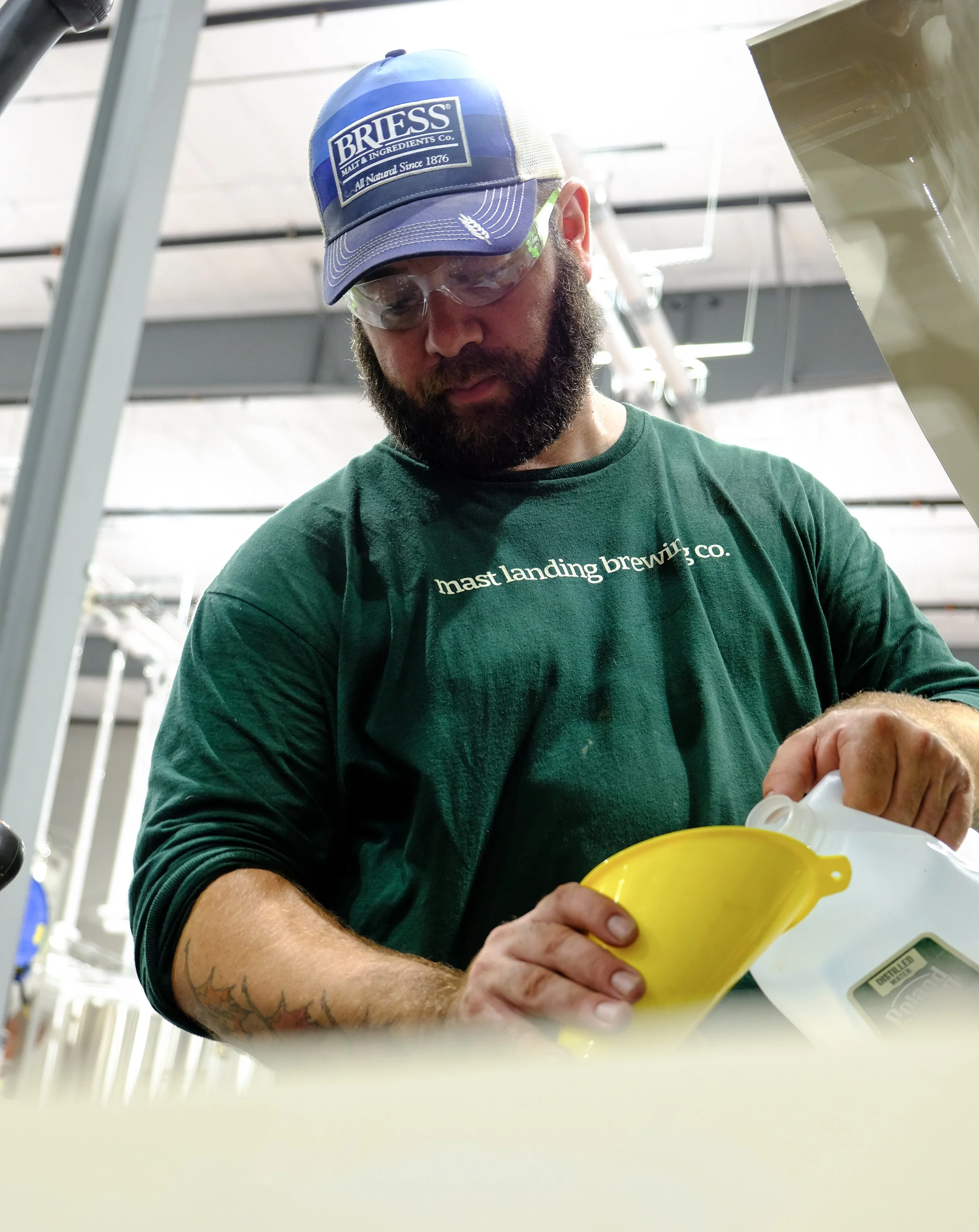 a man works in a brewery