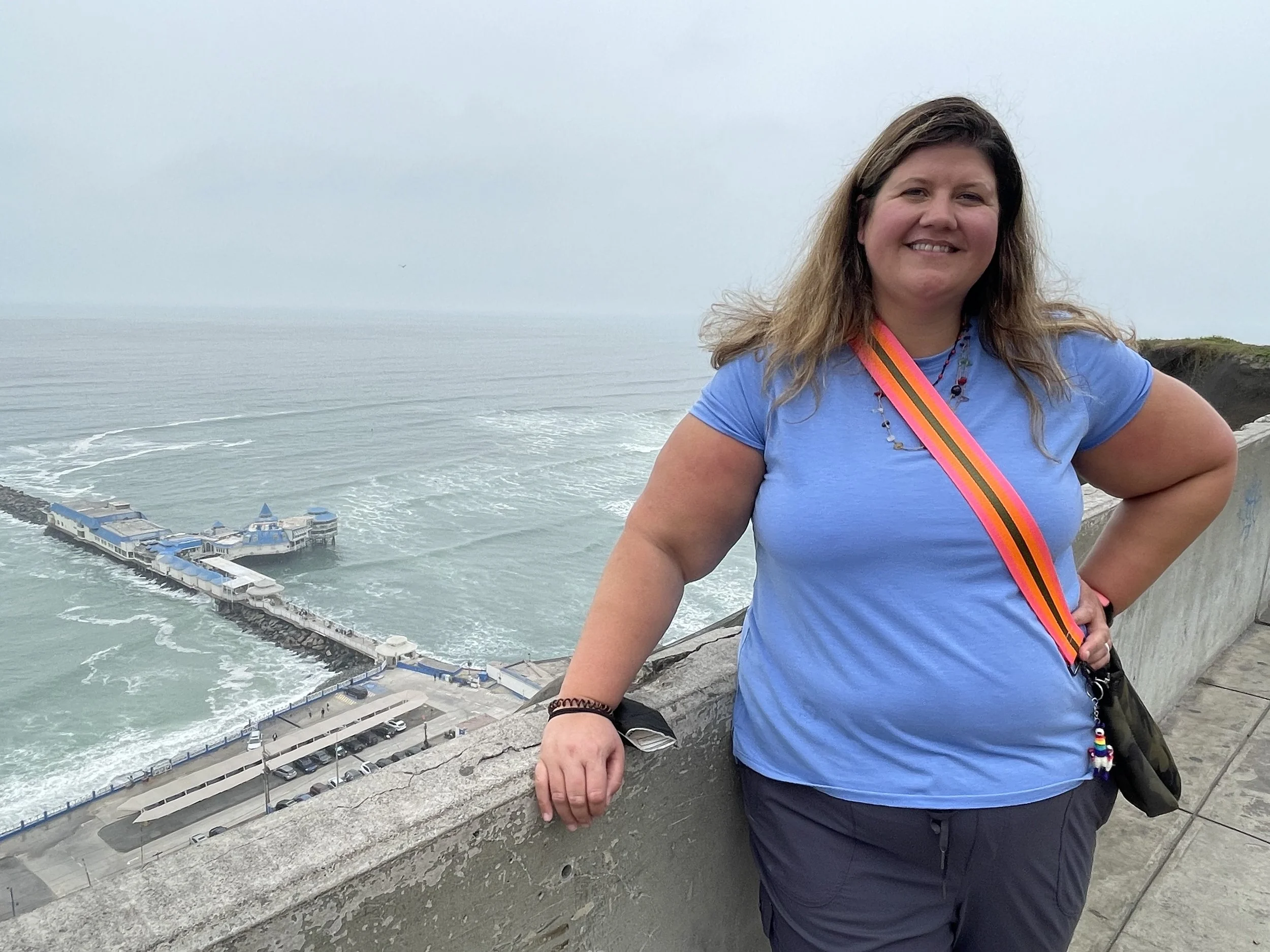 Amanda, an EMDR therapist, overlooking the Pacific Ocean in Lima, Peru.