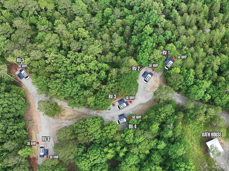 RV Sites now available for booking! Very spacious with plenty of room to spread out between campers AND you can hear rushing Talladega Creek in the canyon below the sites. 30/50amp and water hookups plus a waste station for dumping is almost complete