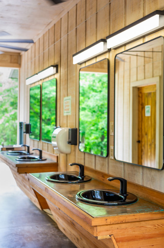 Sink stations and private restrooms at Bohamia bath house in Alabama