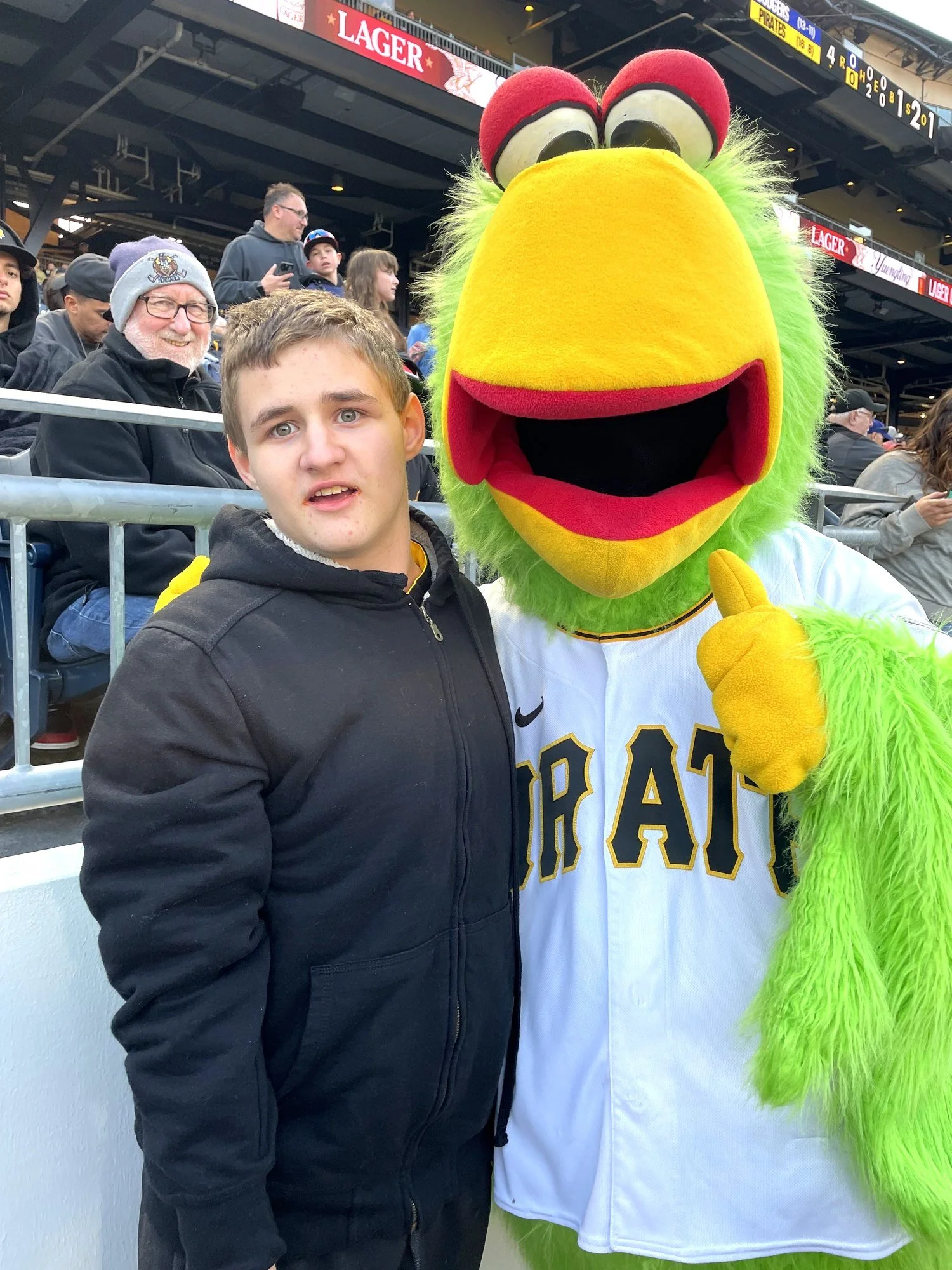 Devin with the Pittsburgh Pirates mascot at PNC Park