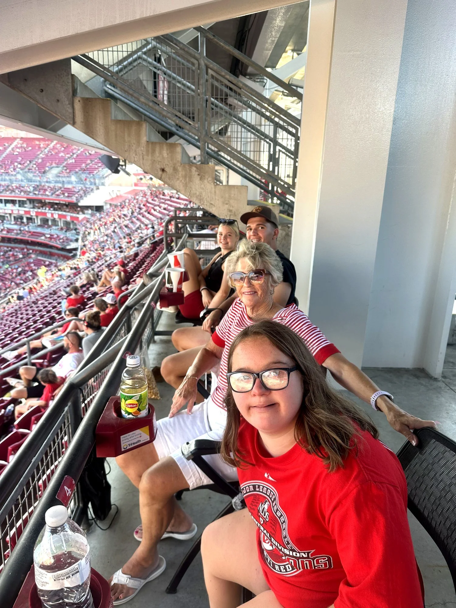 Fans cheering at a Cincinnati Reds game