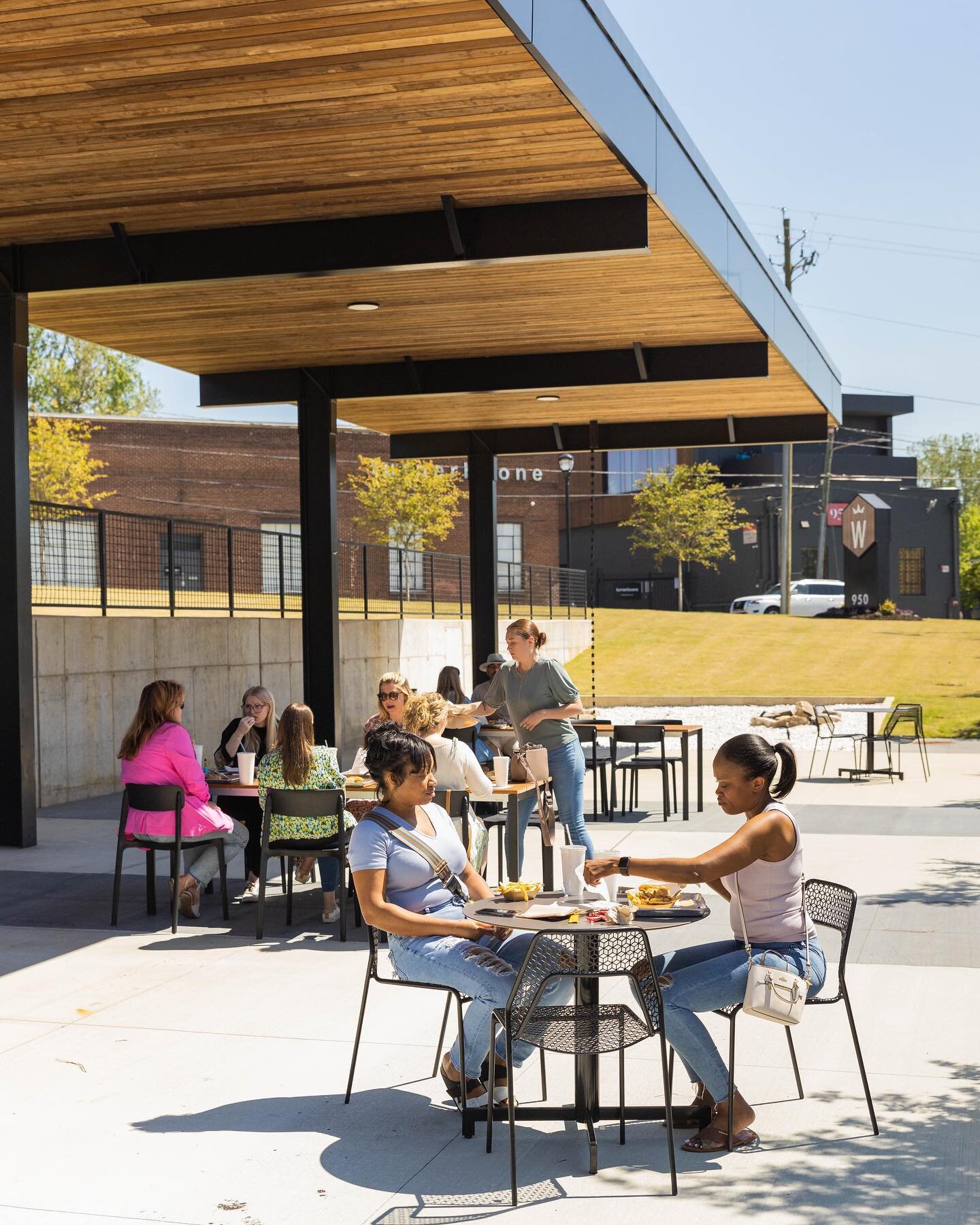 If you haven't had the chance to visit @boxcarbettys at Westside Paper, you're in for a treat! Stop by to try one of their award-winning chicken sandwiches and enjoy our beautiful, outdoor dining area! 🌳