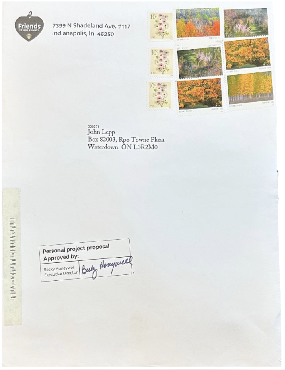 a 9 x 12 outer envelope with 9 bright coloured stamps in the top right corner