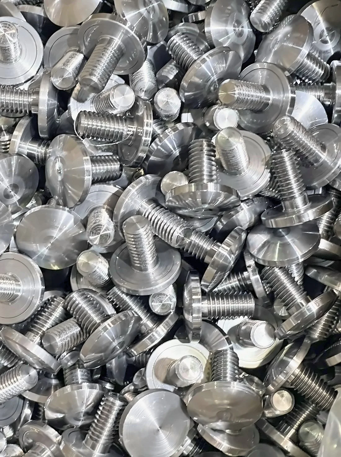 Stainless turned studs, one production lot.