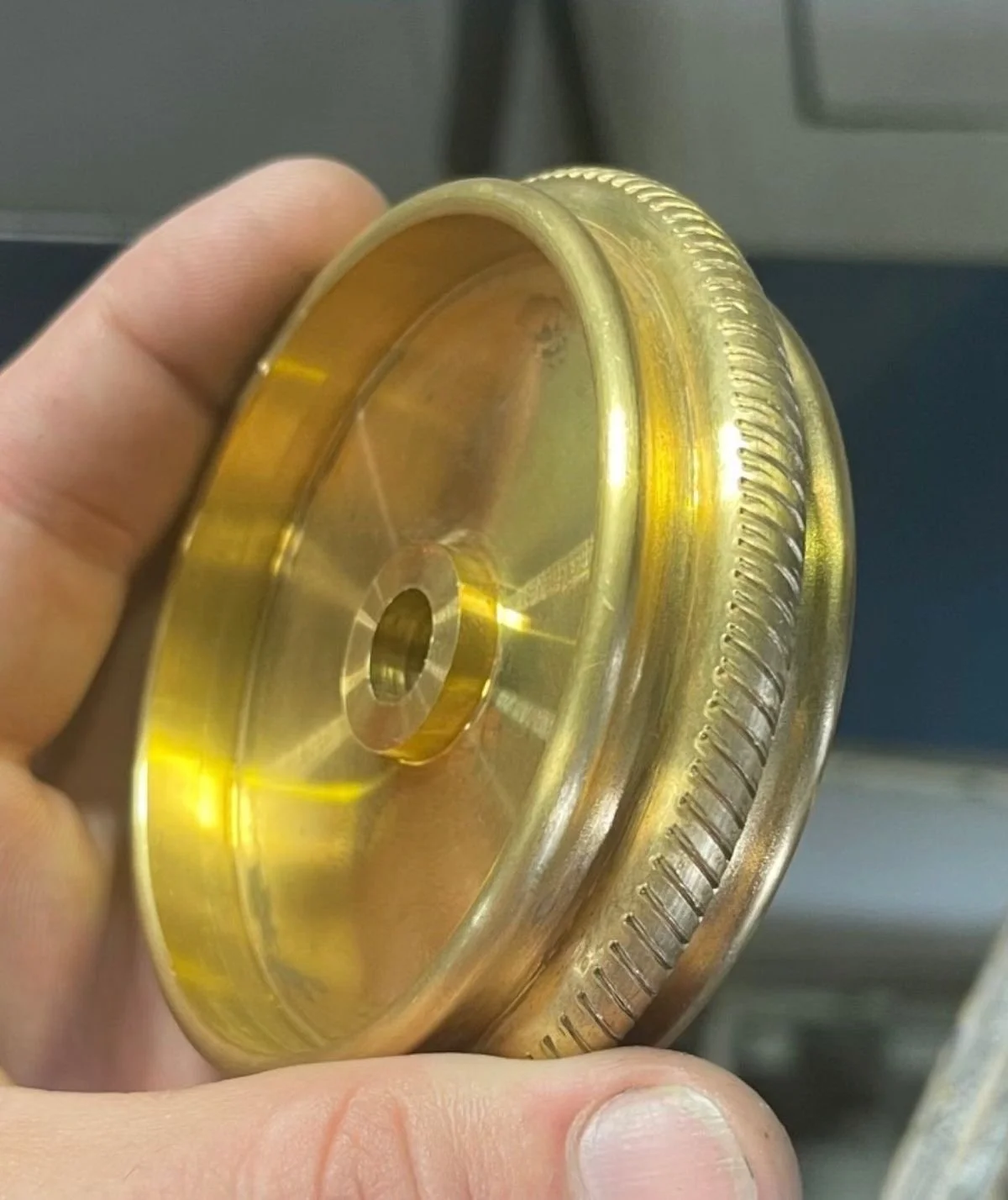 Knurled brass wheel