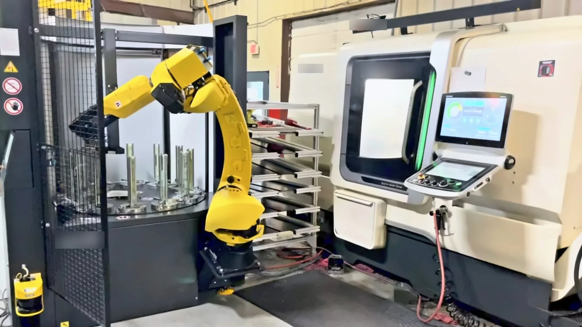 Automated CNC machining cell at PBI