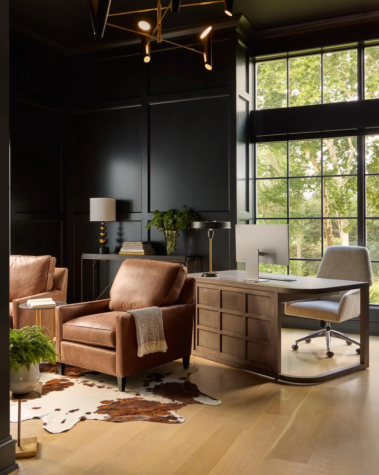 Moody home office where you&rsquo;ll write your first novel, or just check your emails. Designed by @mccanncustominteriors &amp; @bluewaterhomellc. #homeoffice