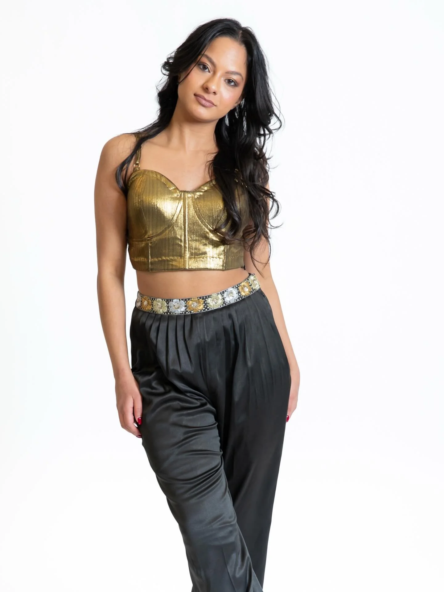 A little shimmer, a little sway ✨
The Afreen Top paired with the Nora Harem Pants is where glamour meets movement. Featuring soft pleats and delicate hand-embroidered floral details along the waist, this look flows with every step while keeping the s